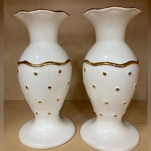 Pair of white with gold candle holders